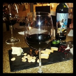 La Costa Wine Co - Try the cheese plate. The crackers are amazing...and gluten free. You can't lose.