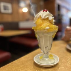 Holsten's - Pineapple sundae, peach and rum raisin (one scoop of each)