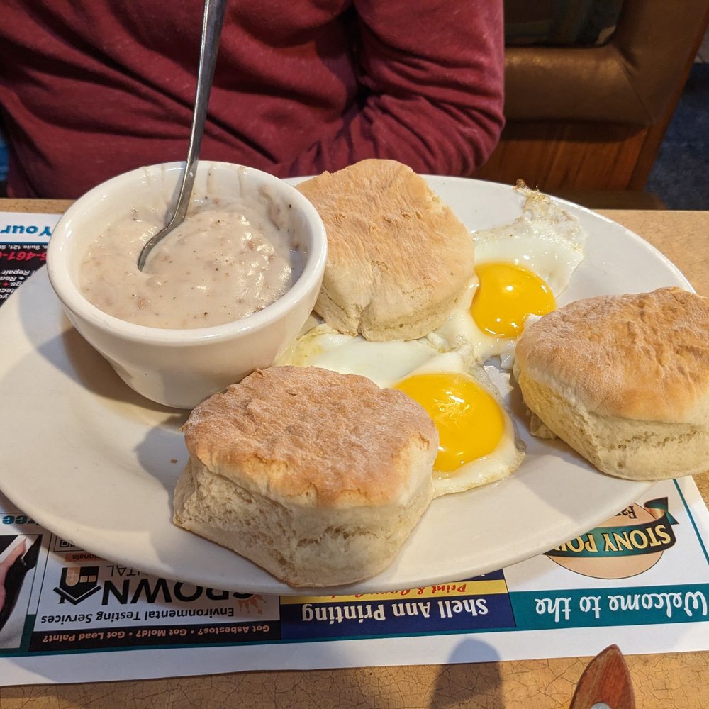 Biscuits and gravy with eggs added
