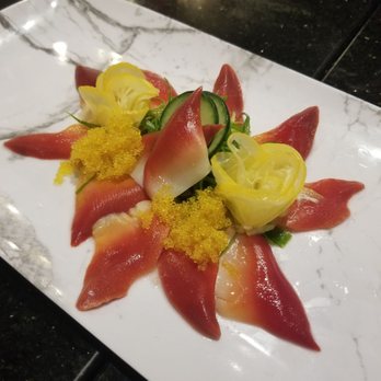 Tang's Sushi - Clam, yuzu infused flying fish roe, seaweed and yuzu florets. Amaazing. - Sushi Bars Near Me - Roseville, California Tang's Sushi - Clam, yuzu infused flying fish roe, seaweed and yuzu florets. Amaazing. - Sushi Bars Near Me - Roseville, California