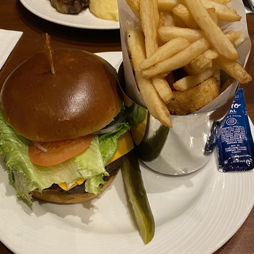 Medium well classic pala burger with American cheese Medium well classic pala burger with American cheese