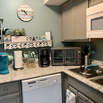 The Victorian Condominiums - Fully functional kitchen with everything fully stocked except for food. - Condominiums Near Me - Galveston, Texas
