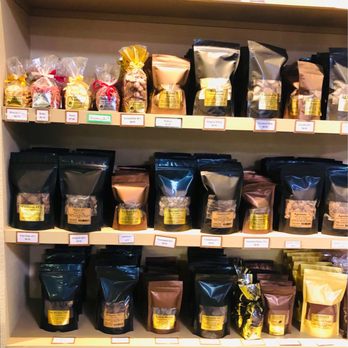 Chocolate Necessities & Gelato - a shelf of chocolates - Coffee & Tea Near Me - Bellingham, Washington