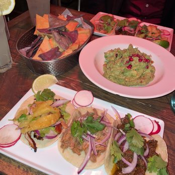 Cena Brooklyn - Left to right: al pastor, carnitas, and carne asada. Large guacamole in the center and fresh lemonades on the side. - Mexican Near Me - Brooklyn, New York