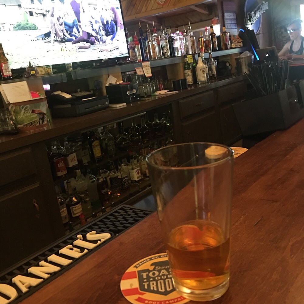 Ok Corral - a glass of whiskey sitting on a bar - Cocktail Bars Near Me - Pioneer, California Ok Corral - a glass of whiskey sitting on a bar - Cocktail Bars Near Me - Pioneer, California