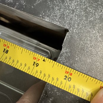 Distinctive Surfaces of Florida - The hole was cut an inch large then required creating an issue with the stove top fitting - Building Supplies Near Me - Sarasota, Florida