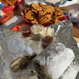 G-Moe sandwich, waffle fries and sweet potato fires. G-Moe sandwich, waffle fries and sweet potato fires.