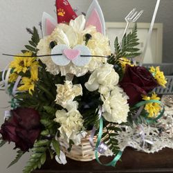 Betty's Flowers & Gifts - The white flowers are all brown, the 2 roses are completely wilted, the daisies are dropping their petals.