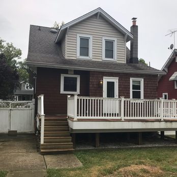 Monumental Contractors - Old cedar shake siding - General Contractors Near Me