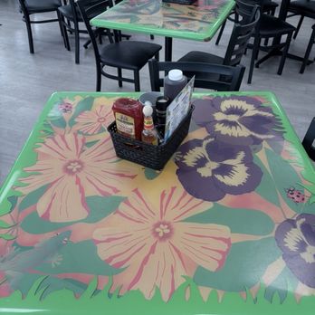 Juno Beach Cafe - Inside table - Breakfast & Brunch Near Me - Juno Beach, Florida Juno Beach Cafe - Inside table - Breakfast & Brunch Near Me - Juno Beach, Florida