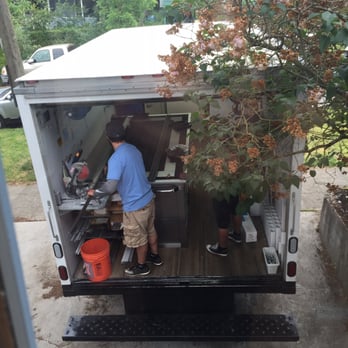 Screenman - Cutting custom screens out of their truck - General Contractors Near Me Screenman - Cutting custom screens out of their truck - General Contractors Near Me
