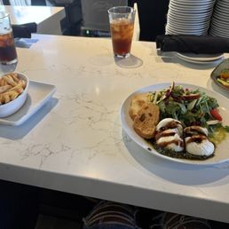 Full Burrata salad . Tuscan chicken and ceviche Full Burrata salad . Tuscan chicken and ceviche
