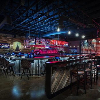 PT's Ranch - a bar with stools and neon lights - Sports Bars Near Me - Las Vegas, Nevada PT's Ranch - a bar with stools and neon lights - Sports Bars Near Me - Las Vegas, Nevada