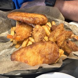 Tilt - Captain's basket. Fish, shrimp, hush puppies and fries. Lots of food.