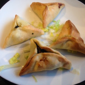 Yalla Grill - The spinach pie appetizer. It was pretty good, but it could use a stronger lemon taste. - Lebanese Near Me - Methuen, Massachusetts Yalla Grill - The spinach pie appetizer. It was pretty good, but it could use a stronger lemon taste. - Lebanese Near Me - Methuen, Massachusetts