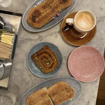 K'Far Cafe - Scallion bagel, yeminite latte, pistachio sticky bun, smoked salmon bagel - Cafes Near Me - Philadelphia, Pennsylvania K'Far Cafe - Scallion bagel, yeminite latte, pistachio sticky bun, smoked salmon bagel - Cafes Near Me - Philadelphia, Pennsylvania