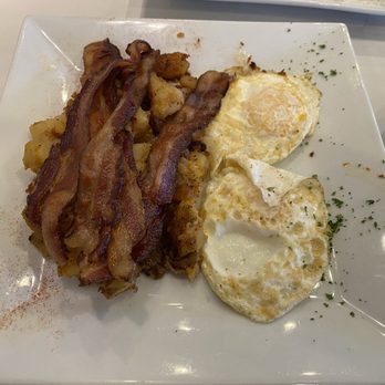 Franklin & Phoebe Brunchery - Eggs over easy with Applewood Bacon and Homefries. Also comes with a nice hearty piece of toast. - Breakfast & Brunch Near Me - Franklin Square, New York Franklin & Phoebe Brunchery - Eggs over easy with Applewood Bacon and Homefries. Also comes with a nice hearty piece of toast. - Breakfast & Brunch Near Me - Franklin Square, New York