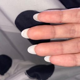 Chunks of acrylic left under the nail because she didn't drill it Chunks of acrylic left under the nail because she didn't drill it