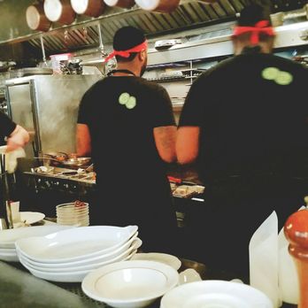 Au Cheval - Grill dudes hard at work. They've got a system in the kitchen, and it hums along nicely. - Bars Near Me - Chicago, Illinois Au Cheval - Grill dudes hard at work. They've got a system in the kitchen, and it hums along nicely. - Bars Near Me - Chicago, Illinois