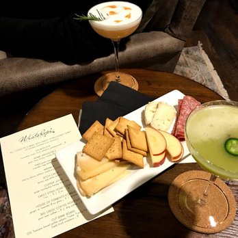 Westslope Distillery - Bitch Creek and Salmon Roe drinks and their small cheese board. The Salmon Roe has pomegranate seeds at the bottom! - Distilleries Near Me - Hamilton, Montana Westslope Distillery - Bitch Creek and Salmon Roe drinks and their small cheese board. The Salmon Roe has pomegranate seeds at the bottom! - Distilleries Near Me - Hamilton, Montana