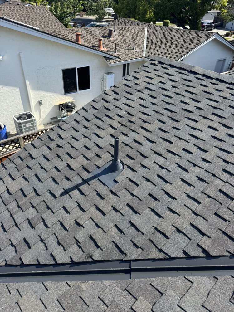 Slide of E & E Roofing