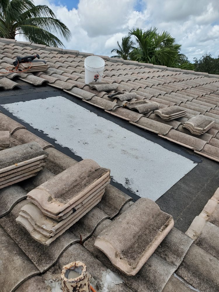 Slide of Rip Tide Roofing