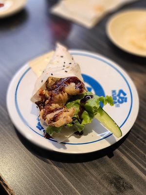 Kura Revolving Sushi Bar by null