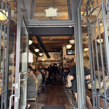 Jam Cafe on Beatty - View from the sidewalk looking in to the restaurant...individual tables run along each side of the center aisle - Breakfast & Brunch Near Me - Vancouver, British Columbia Jam Cafe on Beatty - View from the sidewalk looking in to the restaurant...individual tables run along each side of the center aisle - Breakfast & Brunch Near Me - Vancouver, British Columbia