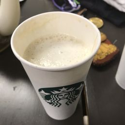 Not full cup of coffee after waiting 14 mins. Not full cup of coffee after waiting 14 mins.