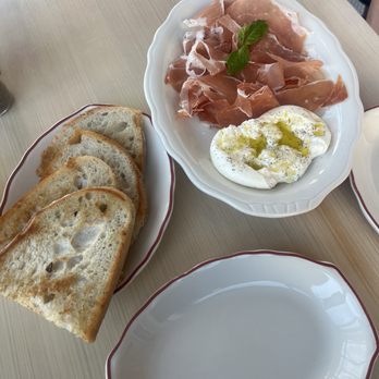 Malfi Enoteca - Burrata and prosciutto with sourdough - Italian Near Me - Oklahoma City, Oklahoma Malfi Enoteca - Burrata and prosciutto with sourdough - Italian Near Me - Oklahoma City, Oklahoma