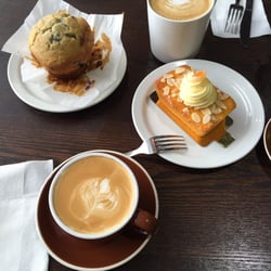Coffee Interchange - Brekky sorted. Flourless orange gluten free cake and regular tasty blueberry muffin.