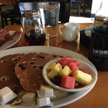 From Scratch Restaurant - The 2 blueberry pancakes were served with a side of fruit. I added the side of bacon; the bacon strips are super thick. Yum! - Breakfast & Brunch Near Me - Carmel, California From Scratch Restaurant - The 2 blueberry pancakes were served with a side of fruit. I added the side of bacon; the bacon strips are super thick. Yum! - Breakfast & Brunch Near Me - Carmel, California