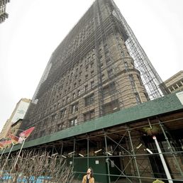 Flatiron building covered in scaffolding Flatiron building covered in scaffolding