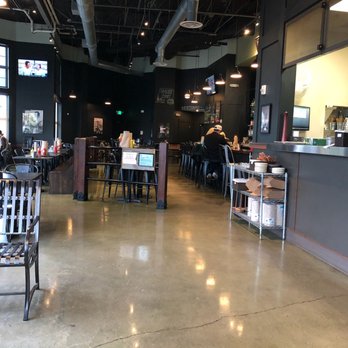 Stack 571 Burger & Whiskey Bar - Minimalist decor with huge wall of booze - Burgers Near Me - Tacoma, Washington Stack 571 Burger & Whiskey Bar - Minimalist decor with huge wall of booze - Burgers Near Me - Tacoma, Washington