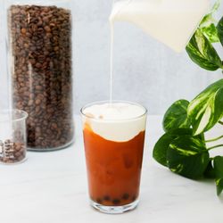 Boba Guys - Sawadee Cloud, a new take on coffee! Thai tea and cold brew coffee topped with our light, creamy cloud.