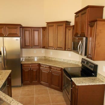 Michaels Homes Inc - kitchen with stainless steel appliances - General Contractors Near Me - Fort Myers, Florida Michaels Homes Inc - kitchen with stainless steel appliances - General Contractors Near Me - Fort Myers, Florida