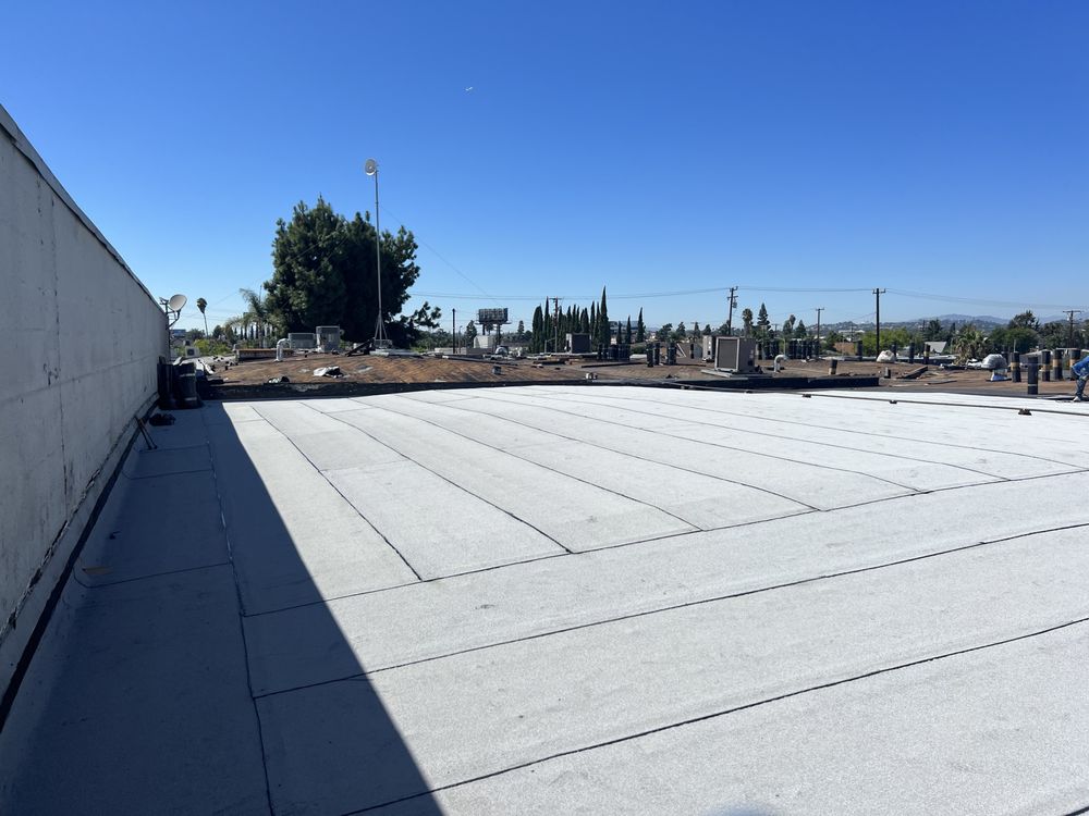 Slide of Millan Roofing Industries