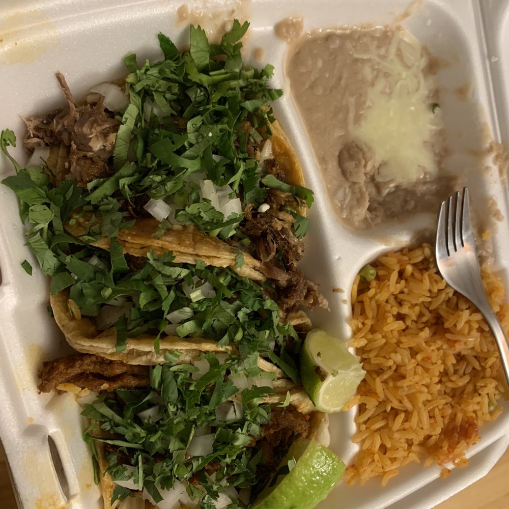 Taco combo: Barbacoa, al pastor, and carnitas. Yummy