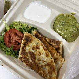 Teacher special quesadilla minus the rice and beans that were supposed to come with the order. Teacher special quesadilla minus the rice and beans that were supposed to come with the order.