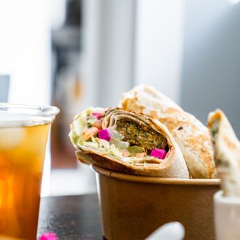BiBi's Middle Eastern Kitchen - Falafel Saj Wrap + BiBi's Signature Iced Tea - Middle Eastern Near Me - Ottawa, Ontario BiBi's Middle Eastern Kitchen - Falafel Saj Wrap + BiBi's Signature Iced Tea - Middle Eastern Near Me - Ottawa, Ontario