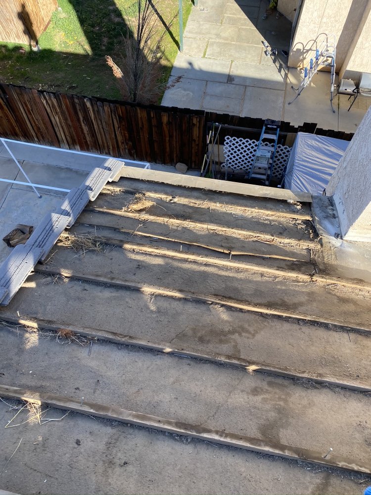 Slide of Benny’s Roofing Services