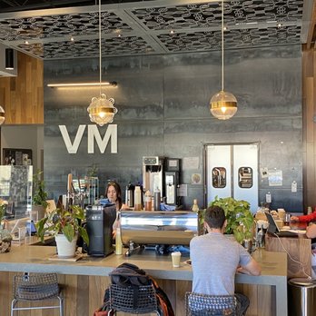 Villa Myriam Roasting - people sitting at a counter - Coffee Roasteries Near Me - Albuquerque, New Mexico