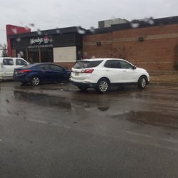 Wendy's - Filthy parking lot! Doesnt get any better inside!