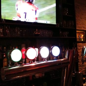 Loaf & Ale - a bar with beer taps and a television - Comfort Food Near Me - Napanee, Ontario Loaf & Ale - a bar with beer taps and a television - Comfort Food Near Me - Napanee, Ontario