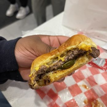 7th Street Burger 86th Street - Cheeseburger with grilled onions, pickles, and sauce - Burgers Near Me - New York, New York