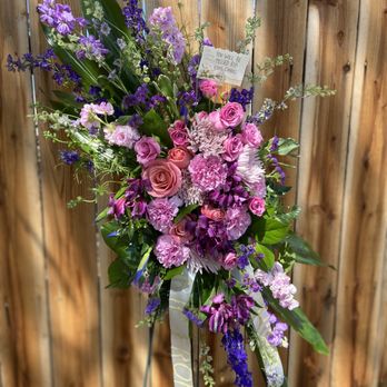 Endless Love Flowers - Sympathy standing spray including purple, blue, and pink flowers with greenery. - Floral Designers Near Me - Riverside, California