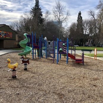 Zapata Park - Playground with Downtown Background - Community Gardens Near Me - Sacramento, California Zapata Park - Playground with Downtown Background - Community Gardens Near Me - Sacramento, California