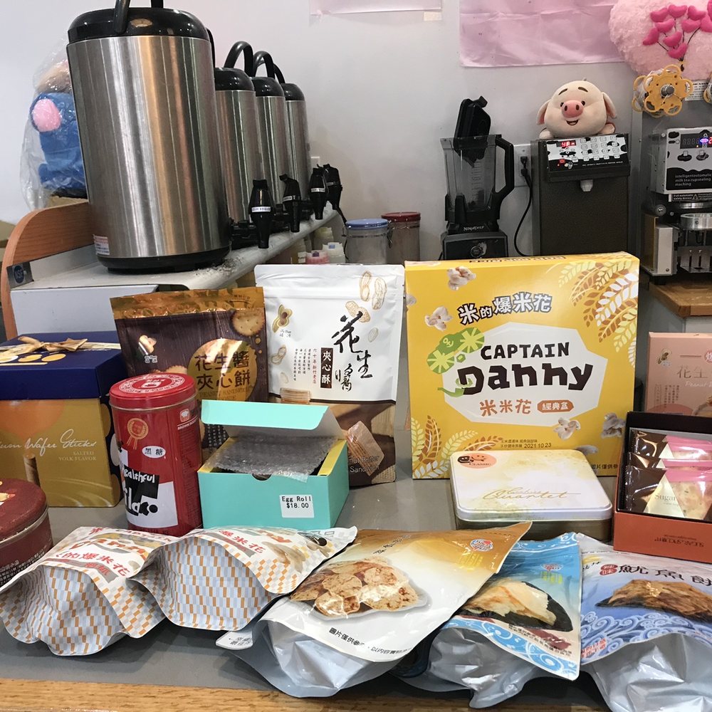 Pig Pig Cafe - a table full of snacks and snacks - Bubble Tea Near Me - Brooklyn, New York Pig Pig Cafe - a table full of snacks and snacks - Bubble Tea Near Me - Brooklyn, New York
