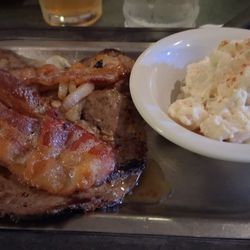 Liver and onions with potato salad.