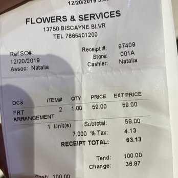 Flowers & Services - This is what 2 dozens roses for "$14.99"come out to be after you get them wrapped. Smh never again - Florists Near Me - North Miami Beach, Florida